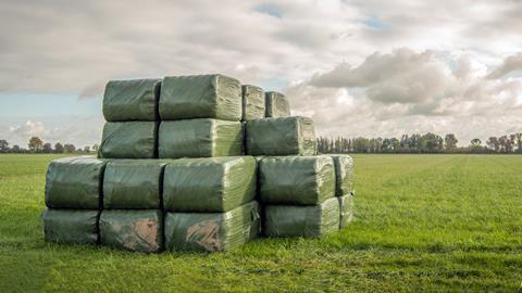 Hay silage bales plastic field farming