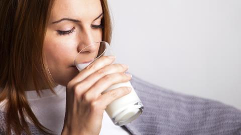 organic milk, woman drinking milk