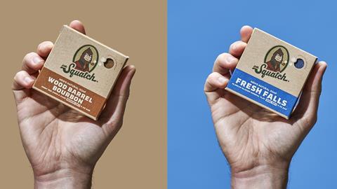 Dr Squatch 4 hands holding soaps