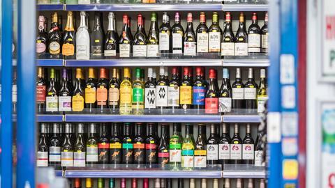 supermarket wine alcohol aisle shelf GettyImages-1305261341
