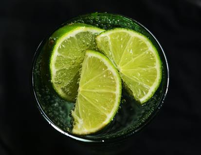 Lime slices in drinking glasses