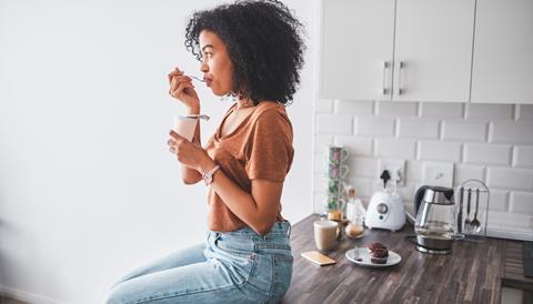 Girl eating yoghurt resized