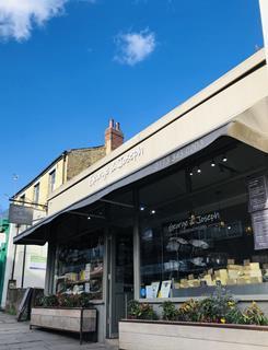 shop front blue sky