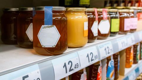 honey bottles supermarket shelf