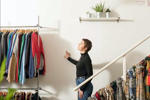 woman-on-clothing-shop-stairs