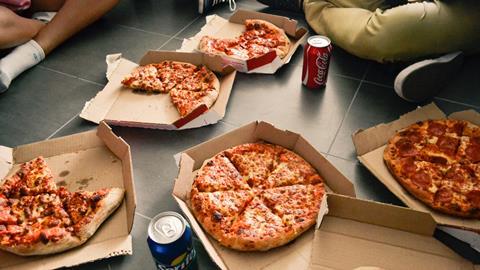 takeaway pizza and soft drinks