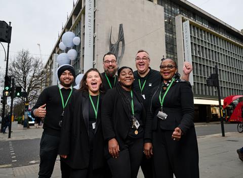 John Lewis staff standing outside Oxford Street store