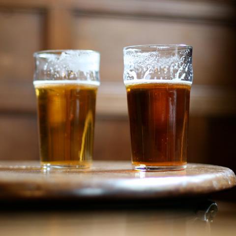 Pints of beer in pub GettyImages-sb10070088h-001