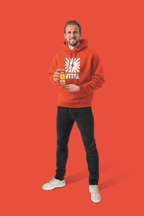 Vital_HarryKane_Standing_Orange_CMYK_02