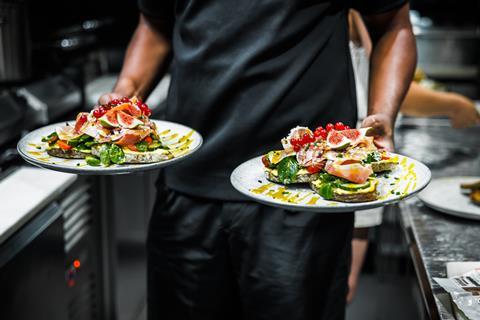 restaurant waiter chef GettyImages-2042524116