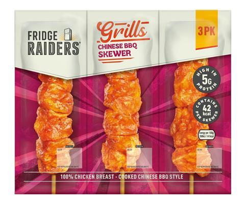 Grills Chicken Skewers in Chinese BBQ