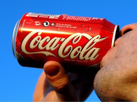 man drinking coke coca cola can one use