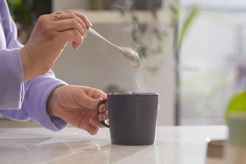 woman making cup of tea