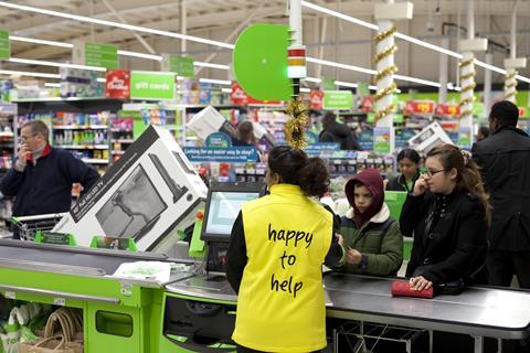 AT THE TILLS: The reaction to Asda's Black Friday sale has been phenomenal. Excited shoppers rush to Asda stores to snap up the best Black Friday deals. Customers have been queuing since 5am to get their hands on the deals, with a 40