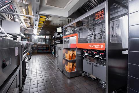 Automated chip fryer at Nando's in Park Royal, London