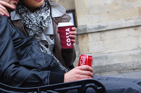 Man drinking Costa Cofee and Coca-Cola