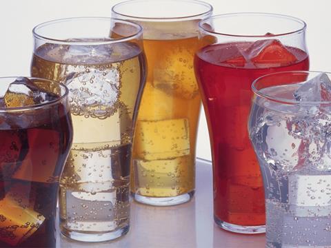 focus on soft drinks, glasses of drink and ice