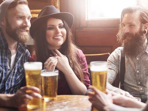 friends in pub drinking beer