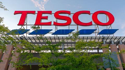 tesco store sign tree GettyImages-1426886264