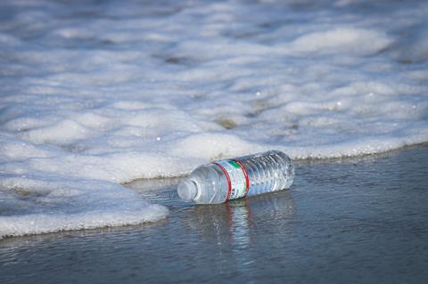Plastic bottle ocean beach