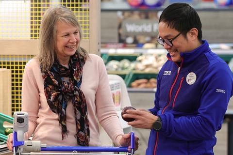 tesco staff worker veg shopper