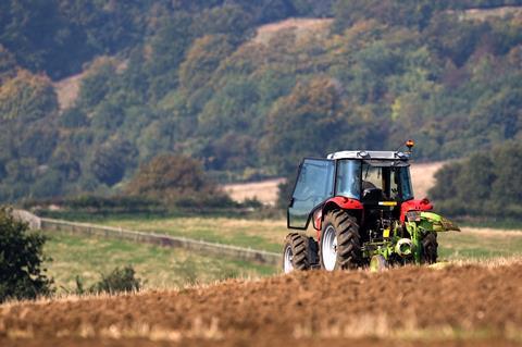 Tractor farming field