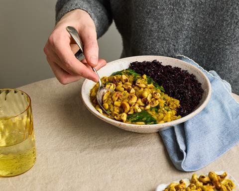 ZOE_ Sweetcorn and Spinach Dhal with Curried Cashews_landscapehand