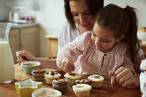 Child baking cupcakes
