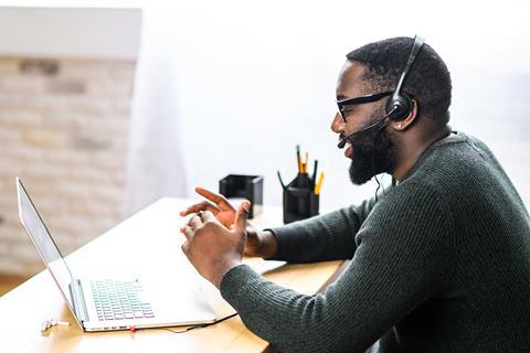 Sales man on call laptop computer