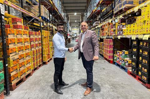 Enzo Wholesale MD Umit Aydemir (pictured left) with Unitas member development controller Stephen Cheetham