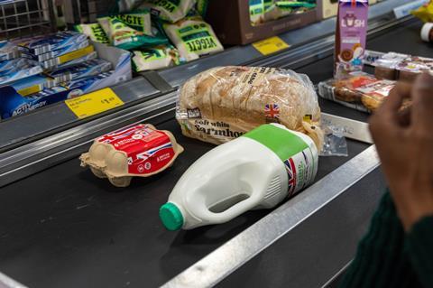 groceries food bread milk essentials  GettyImages-1411233261