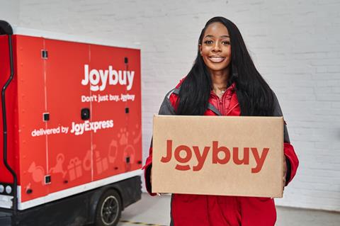 joyexpress-courier-portrait-holding-package-joybuy-2026-scaled