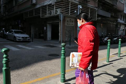 chinese woman wearing mask coronavirus