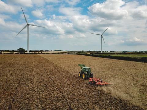 field farming tractor wind turbines