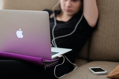 child on laptop computer