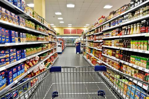 trolley in supermarket aisle