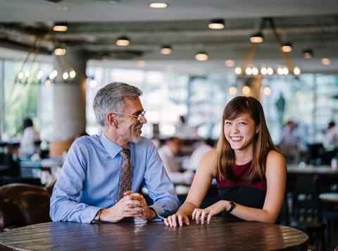 man and woman boss meeting