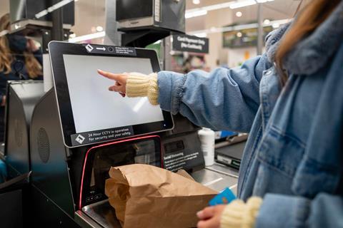 self checkout supermarket technology GettyImages-1328356012