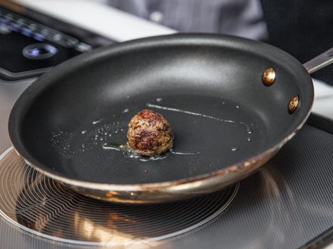 Memphis Meats lab-grown beef meatball in a frying pan