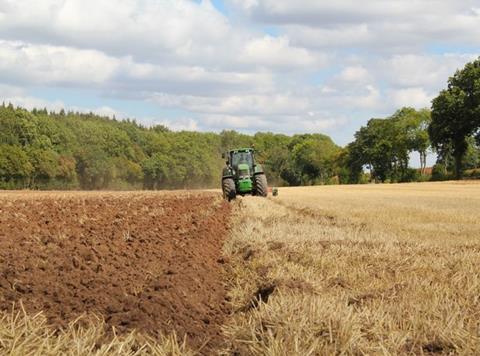 tractor farming ploughing field