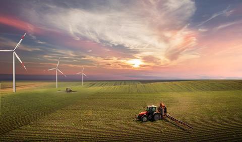 eco sustainability wind power farming farm tractor GettyImages-1370265820