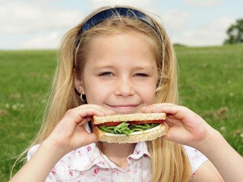 child with sandwich