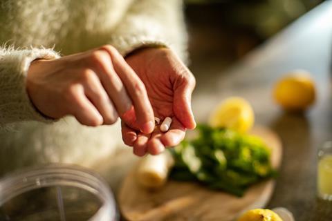 woman taking supplements