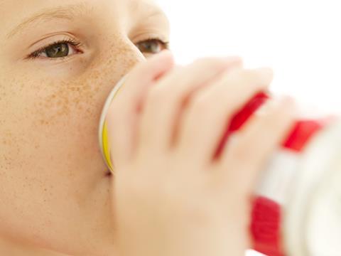 kid drinking drink can sugar energy