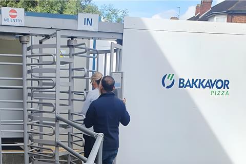 Workers enter the Bakkavor Pizza production site in Harrow  GMB London Region 2100x1400