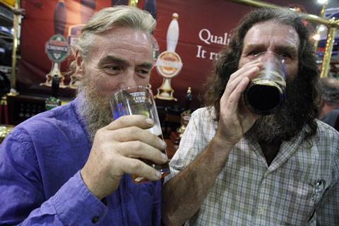 men drinking beer ale camra