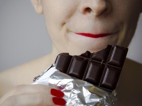 woman eating chocolate