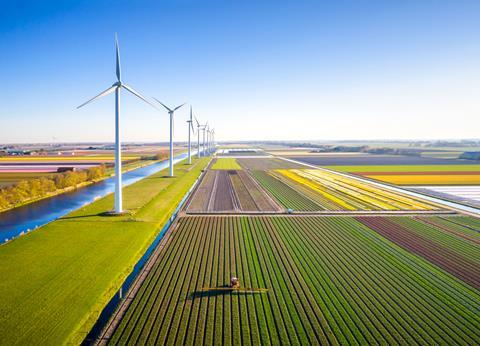 farming farm wind turbine sustainable sustainability eco climate change GettyImages-1396844586