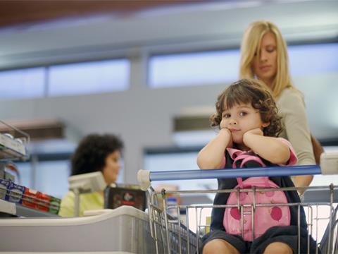 Child at checkout