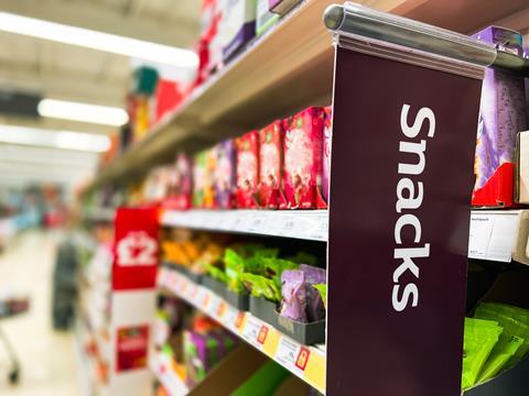 snack aisle supermarket hfss GettyImages-1430384008